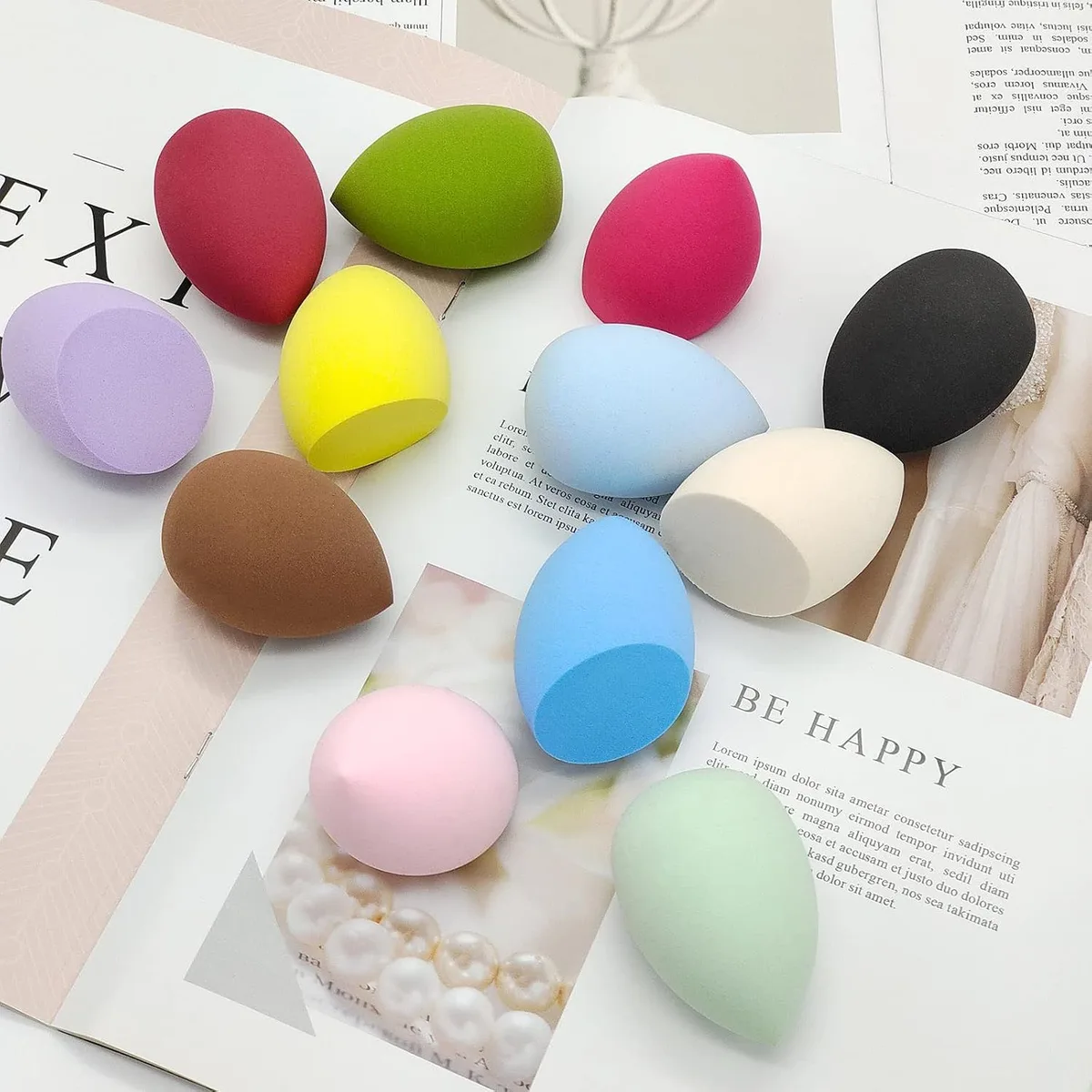 latex-free makeup sponges in soft colors on a vanity