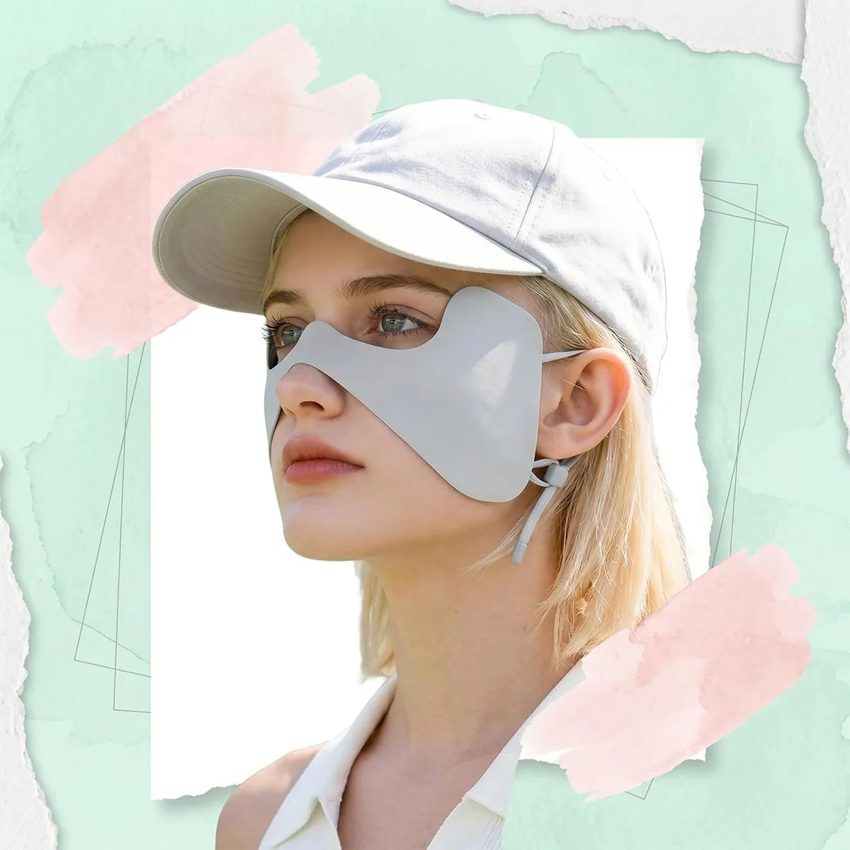 grey UPF 50+ sun face mask worn with a baseball cap