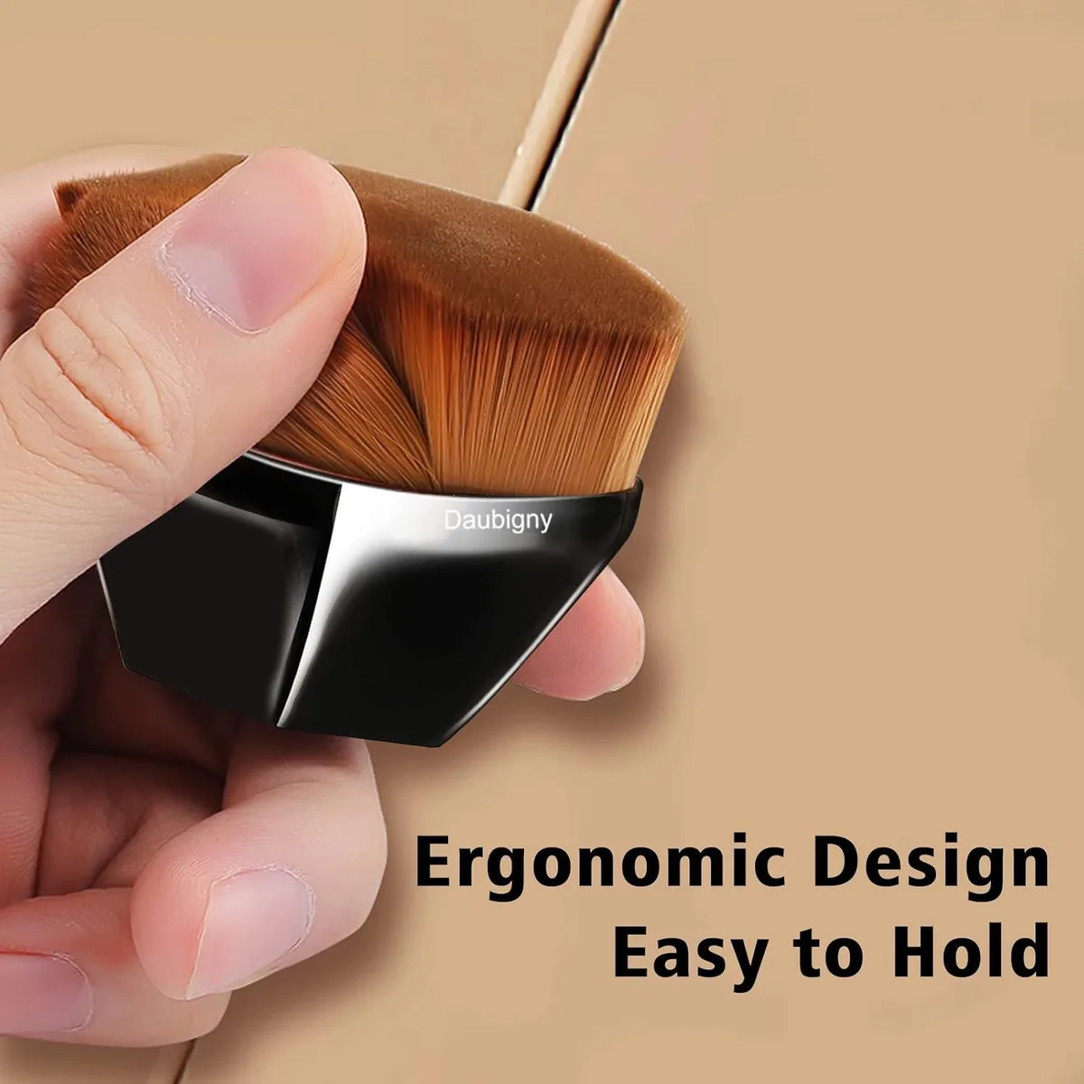 hand holding the flat top kabuki foundation brush by its hexagon handle