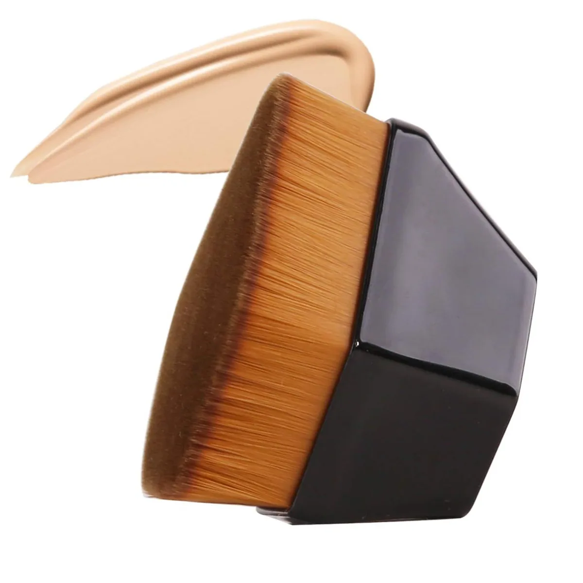 wide flat head of the kabuki foundation brush with a foundation swatch