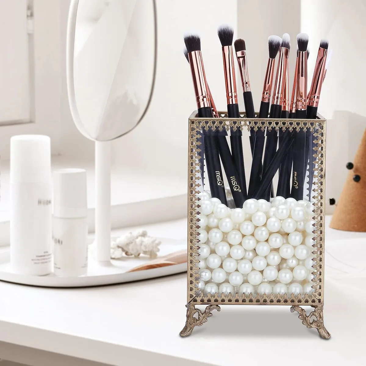 eye makeup brushes standing upright on a vanity