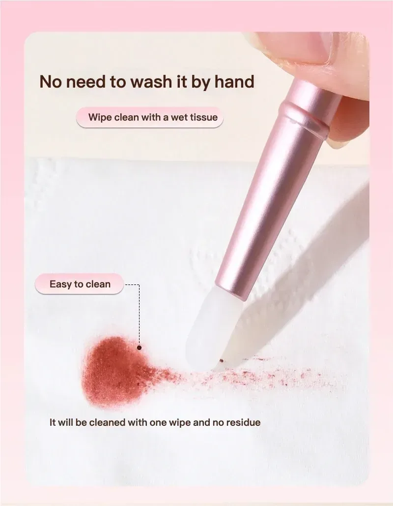 mini silicone lip brush wiped clean on a wet tissue