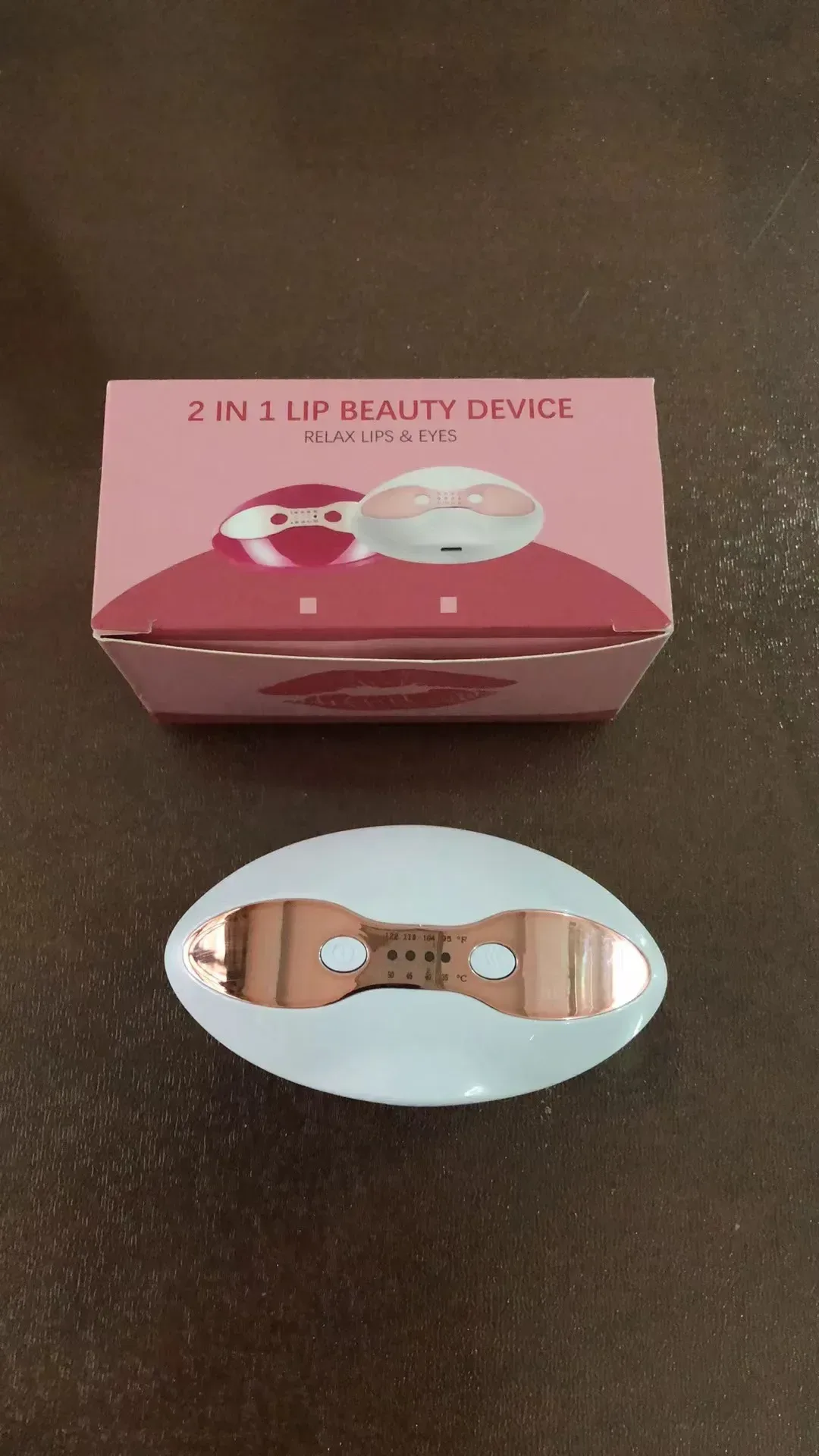 heated LED lip care device with its gift box